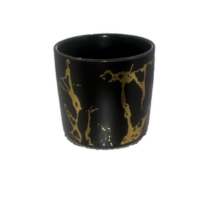 black and gold decorative cup